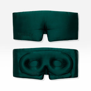 Front and back view of the dark green Ivy Garden - Eyelash Protecting Mask, featuring contoured eye cups and a nose cutout designed for eyelash protection.