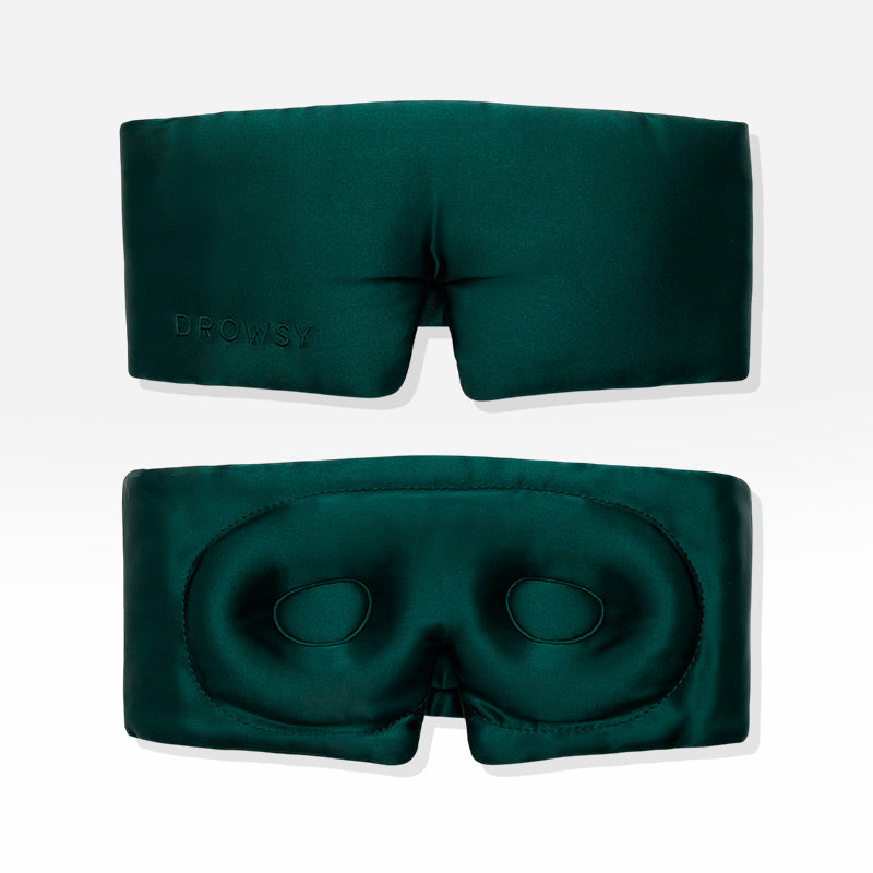 Front and back view of the dark green Ivy Garden - Eyelash Protecting Mask, featuring contoured eye cups and a nose cutout designed for eyelash protection.
