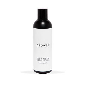Drowsy deep shine silk care washing detergent on a white background