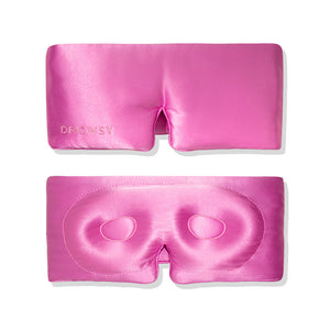 Two views of the Hotel Paradiso Heatwave Eyelash Protecting Mask by us.drowsysleepco: The top shows its shiny pink exterior, while the bottom features a blackout design with space for eyes and eyelash protection.