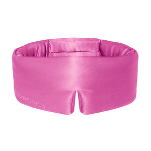 The Hotel Paradiso Heatwave Sleep Mask by us.drowsysleepco is a pink padded silk adjustable blackout mask with "Drowsy" embroidered on the side, designed to fully cover your eyes and block out light.