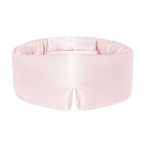 The Petal Pink sleep mask by us.drowsysleepco is a light pink, padded silk eye mask with a wide seamless band and “DROWSY” embroidery. This plush blackout mask fully covers your eyes for uninterrupted beauty sleep.