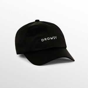 The Drowsy Silk Cap - Black Jade by Drowsy features DROWSY embroidered in white on the front, making it a stylish choice for outdoor workouts or sunny days. Shown against a plain white background.