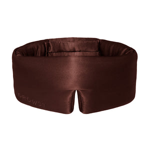 Brown, padded silk sleep mask designed to block out light and provide comfortable sleep.