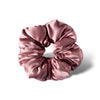 The drowsysleepco Damask Rose - Padded Scrunchie is a shiny, silky pink oversized hair accessory with a smooth texture, shown in a circular shape on a white background—ideal for comfortable sleep.