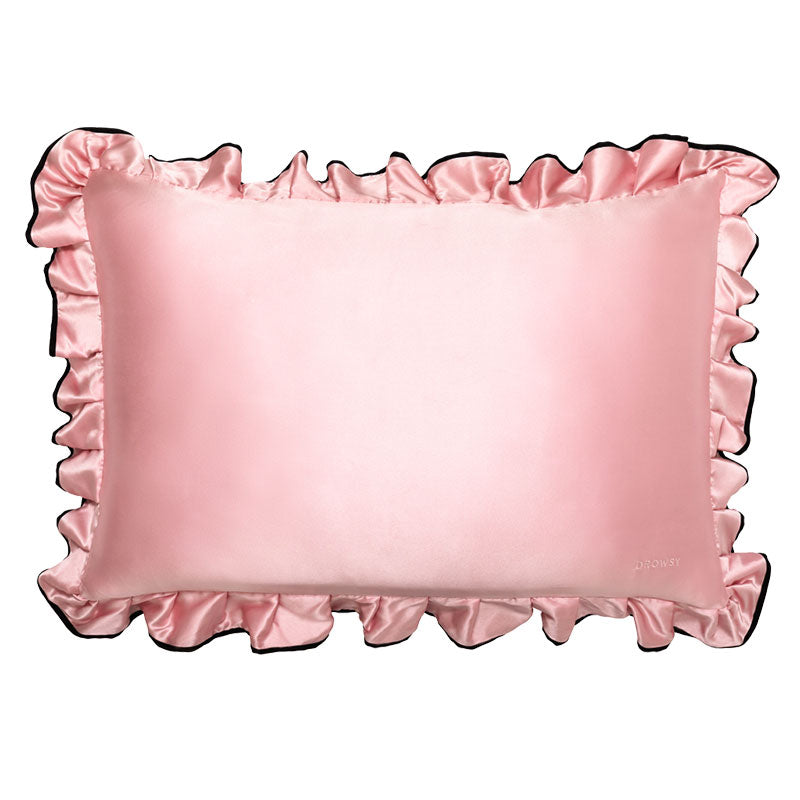 The drowsysleepco Sleep and the City - Pink & Black Pillowcase features a rectangular pink satin design with ruffled edges and a glossy finish, shown against a white background.